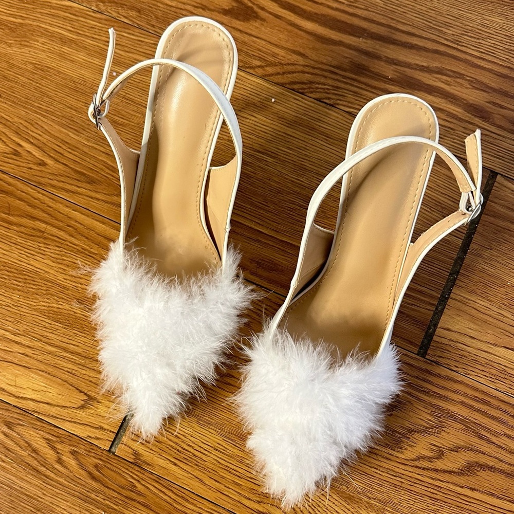 White fuzzy heels.